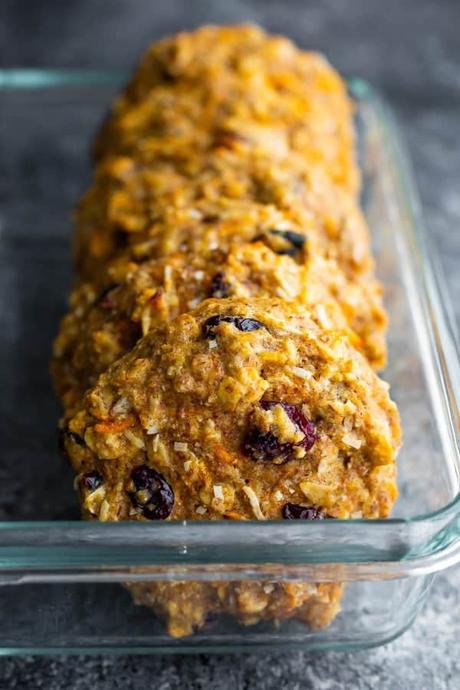 side view of a row of morning glory breakfast cookies in glass container