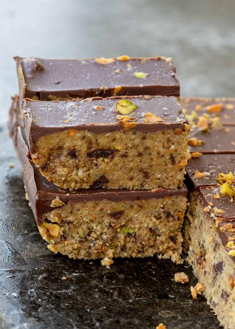 a couple pistachio bars stacked atop one another