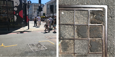 Interesting man hole covers in Camden – numbered and wood-filled