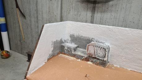 Making a Nativity diorama inside an antique steamer trunk: painting with a layer of white primer