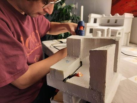 Making a Nativity diorama inside an antique steamer trunk: adding the LED lights to the buildings