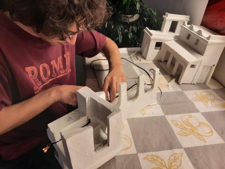 Making a Nativity diorama inside an antique steamer trunk: adding the LED lights to the buildings