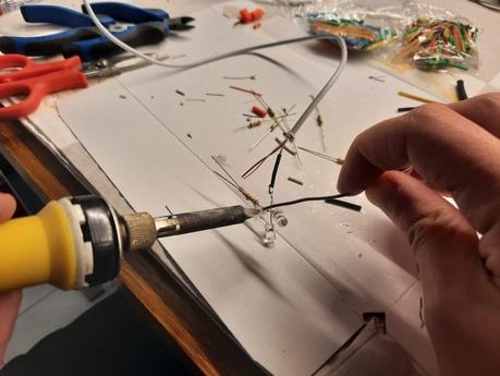 Making a Nativity diorama inside an antique steamer trunk: adding the LED lights to the buildings