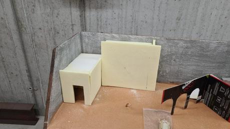 Making a Nativity diorama inside an antique steamer trunk: carving the houses out of foam
