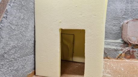 Making a Nativity diorama inside an antique steamer trunk: carving the houses out of foam