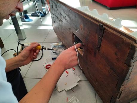 Making a Nativity diorama inside an antique steamer trunk: connecting the lights