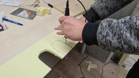 Making a Nativity diorama inside an antique steamer trunk: carving the houses out of foam