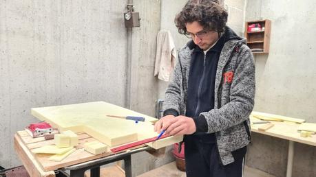 Making a Nativity diorama inside an antique steamer trunk: carving the houses out of foam