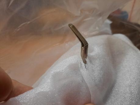 The Orsha vintage toy sewing machine I chose for my daughter The bent tension bar of my Orsha sewing machine as it came out of the box