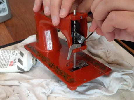 The Orsha vintage toy sewing machine I chose for my daughter Putting grease on the inner mechanisms of the second Orsha sewing machine