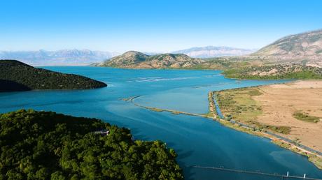 The Albanian Riviera: Best Beaches, Towns, and Hidden Gems picturesque-view-of-butrint-national-park-unesco-world-heritage-site-with-inland-waterways-islands-and-mountains