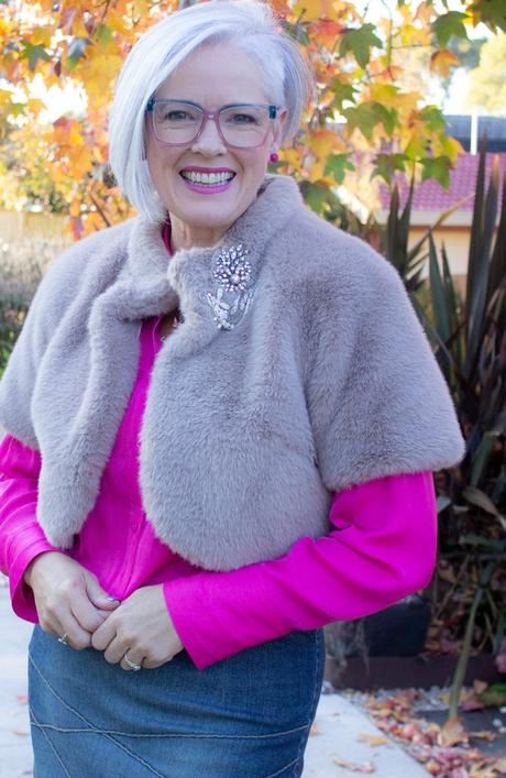 A brooch adds instant polish plus layer like a stylist - don't keep your faux fur for evening, wear it in the day with denim