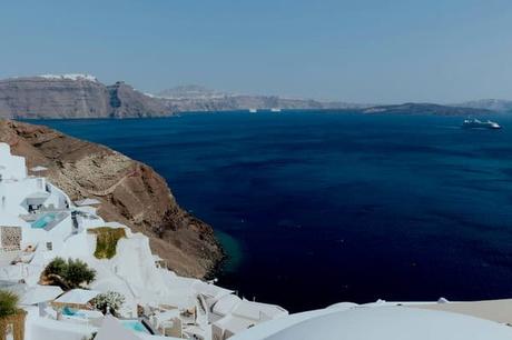 Summer Wedding In Oia With A Lush Floral Arch