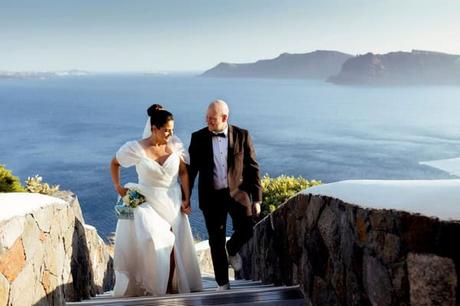 Summer wedding in oia with a lush floral arch | Katy & Craig Summer wedding in oia with a lush floral arch | Katy & Craig