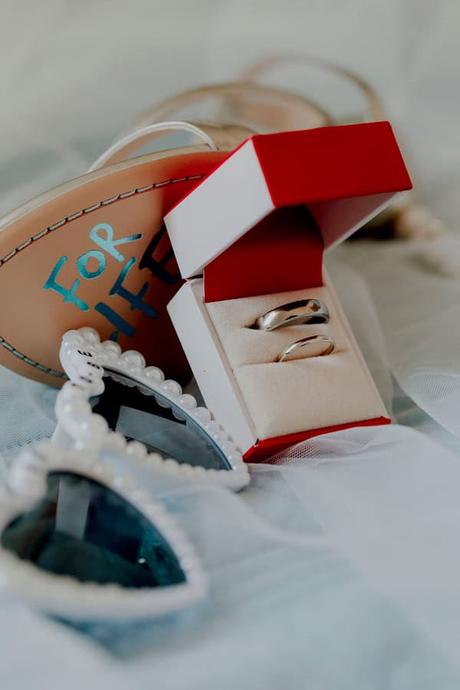 Summer Wedding In Oia With A Lush Floral Arch