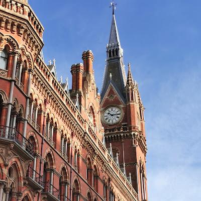 Illustrative photo of St Pancras station, showing part of the elaborate Victorian Gothic facade and the clock tower.