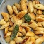 an overhead shot of cottage cheese gnocchi in a skillet with brown butter and sage