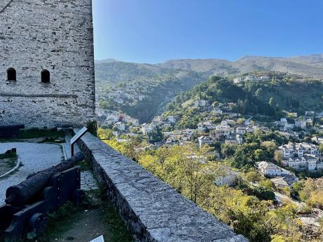 Beautiful Ottoman old town of Gjirokaster  overlooking lush green hills, captured from the walls of the castle.