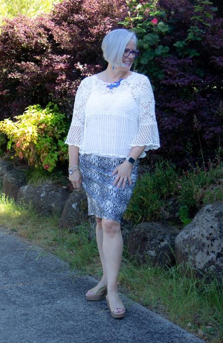 crochet top with snakeskin skirt