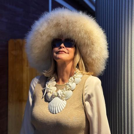 Doing More Creatively  and  Buying  Less