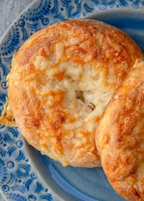 high protein bagels with cottage cheese on a blue plate