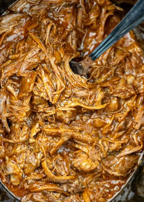 Shredded Beef Tacos a crockpot full of shredded beef for tacos