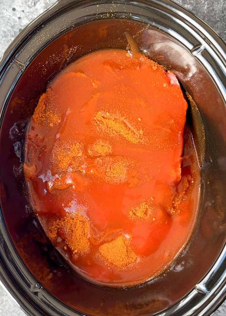 Shredded Beef Tacos beef roast covered in taco seasoning and enchilada sauce