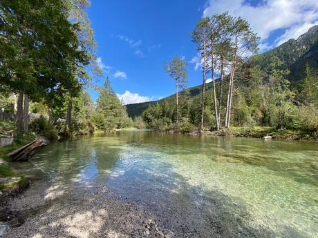 A day in Toblach exploring the surroundings Pristine stream flowing to the lake