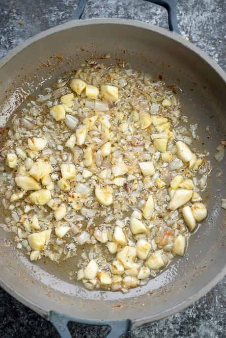 garlic and shallots in a skillet