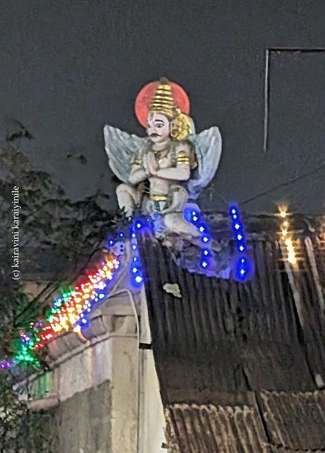 Red hued moon behind Garuda  ~  மலரும் வான் நிலவும் சிந்தும் அழகெல்லாம்