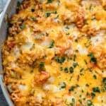 melty cheese and chopped herbs atop an easy stuffed pepper skillet