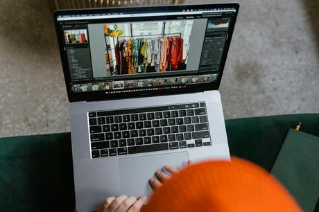 Zendesk Acquires AI Agent Startup Forethought for $665M A pristine ecommerce workspace scene with a high-end tablet and smartphone displ