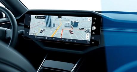 Close-up view of a modern car dashboard with a large touchscreen displaying imme