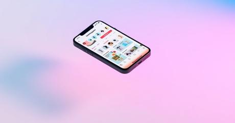 A realistic iPhone 15 Pro in Space Black floats at a slight angle above a pure w