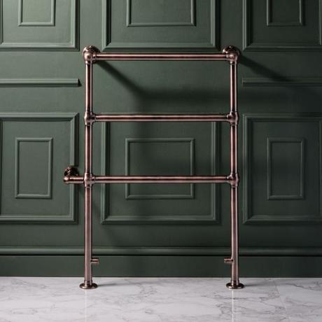 Milano Derwent minimalist brushed bronze electric traditional heated towel rail on dark green wall