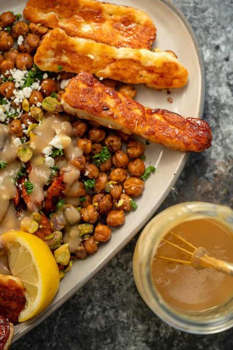 salad ingredients and tahini dressing