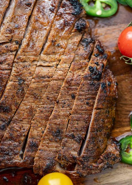 Carne Asada Tacos sliced carne asada on wooden cutting board