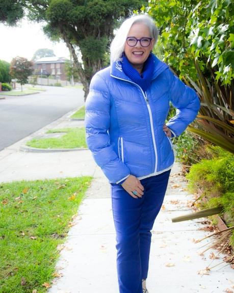Balancing Flamboyant Style with a Practical Lifestyle Even your puffer jacket can in a fun colour