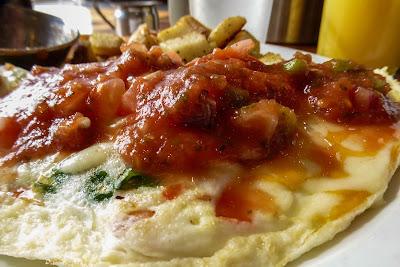 The icon, the omelette, and some grass