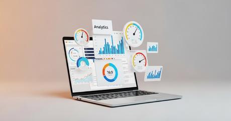 A sophisticated laptop computer with its screen showing a clean analytics dashbo