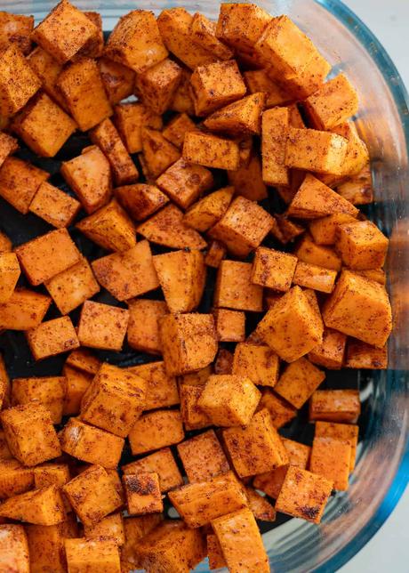 a close up of air fryer sweet potatoes