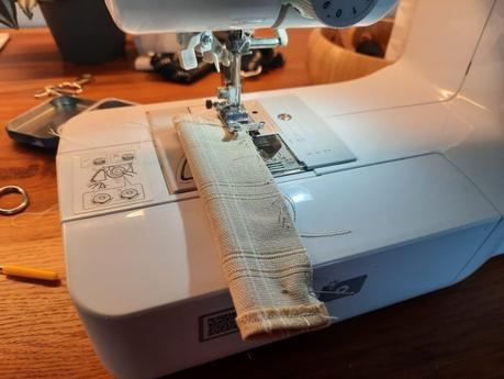 Making the attachments for my bodhran bag's shoulder strap