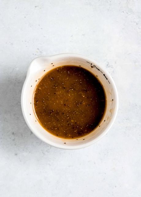 overhead image of salad dressing in a white bowl