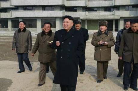 Kim Jong Un smokes a cigarette whilst touring Songdowon International Children's Camp (Photo: Rodong Sinmun).