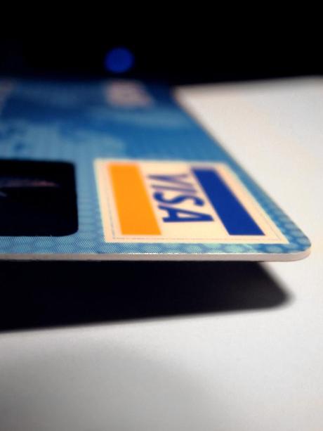 Pay off high interest credit cards first to become debt-free. Photo Credit: Nacu
