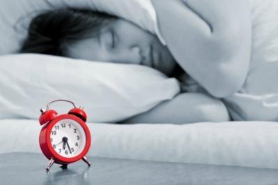 Teenager Ignoring Alarm Clock Due to Sleep Deprivation