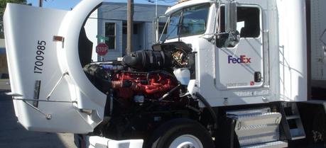 A Kenworth truck equipped with a Cummins diesel engine.