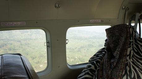 Lady sleeping on plane. Entebbe to Kisoro with Aerolink