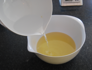 mixing the oils, butters, and lye water