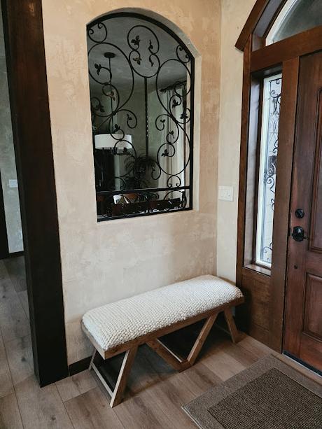 Mid-century modern Lightwood entry bench with textured cream upholstered top